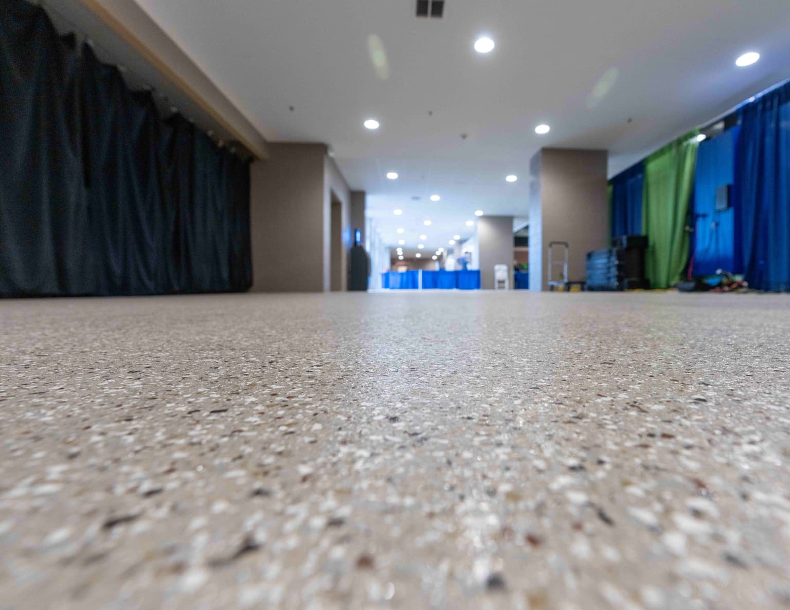 Large-scale convention center with expansive polished concrete flooring
